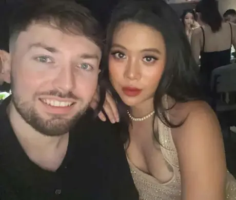 Ryan, co-founder of Landed & Settled, pictured with a friend